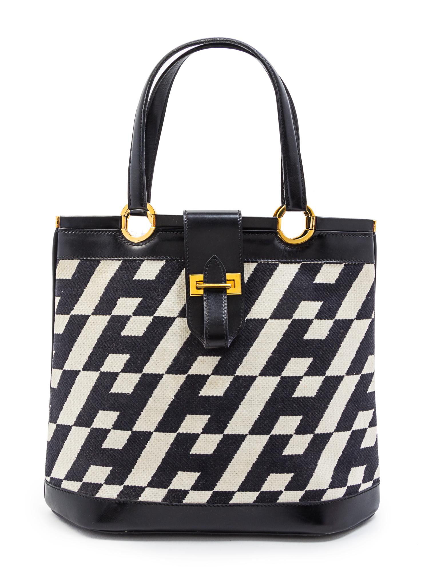 A Rare Hermes Ulysses Black Leather and Ivory Canvas Bag, 12 x 10 x 4 1/2 inches.