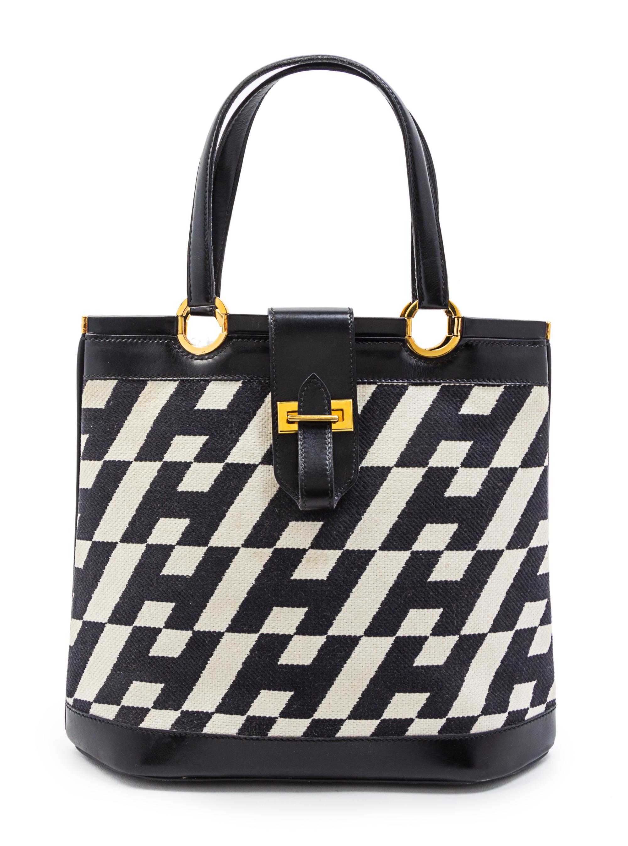 A Rare Hermes Ulysses Black Leather and Ivory Canvas Bag, 12 x 10 x 4 1/2 inches.