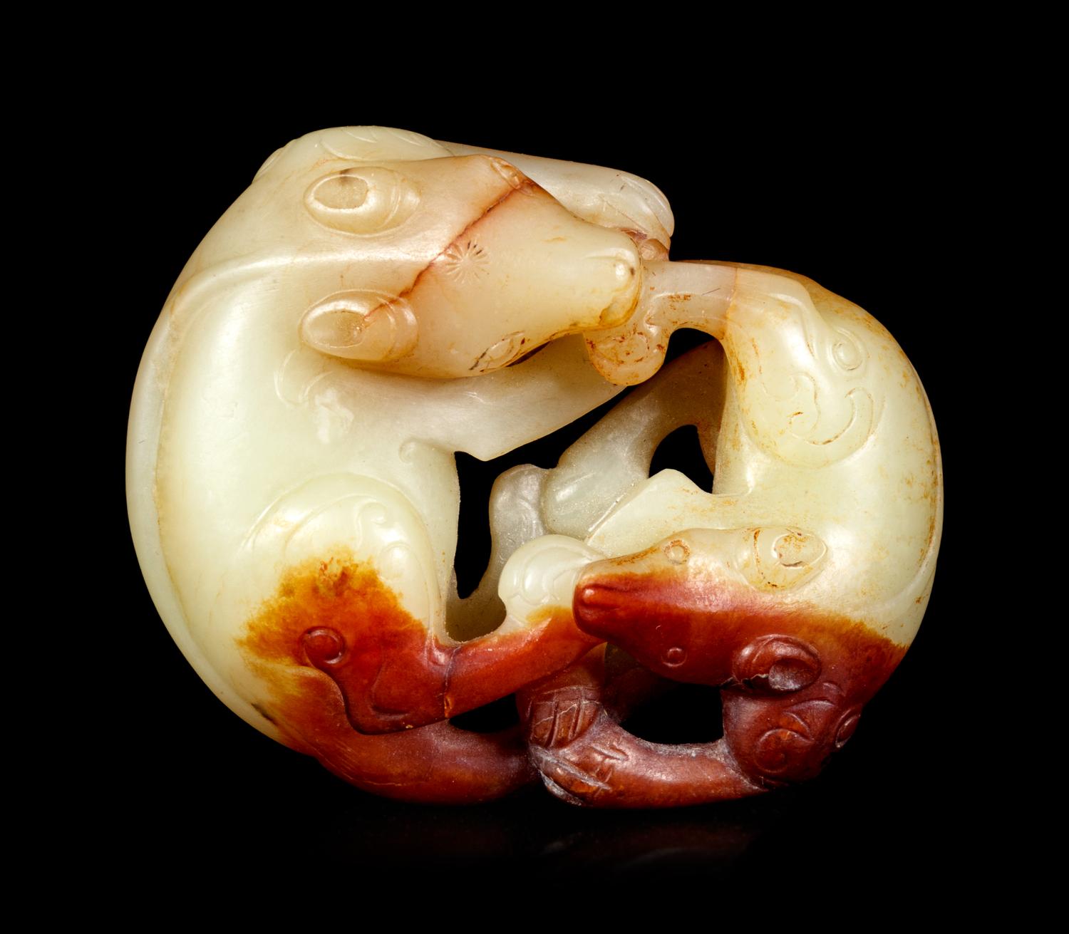 A Yellow and Russet Jade Carving of Double Badger