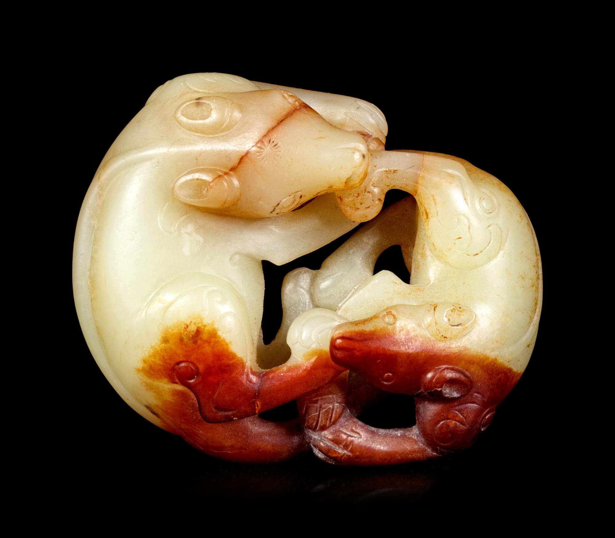A Yellow and Russet Jade Carving of Double Badger