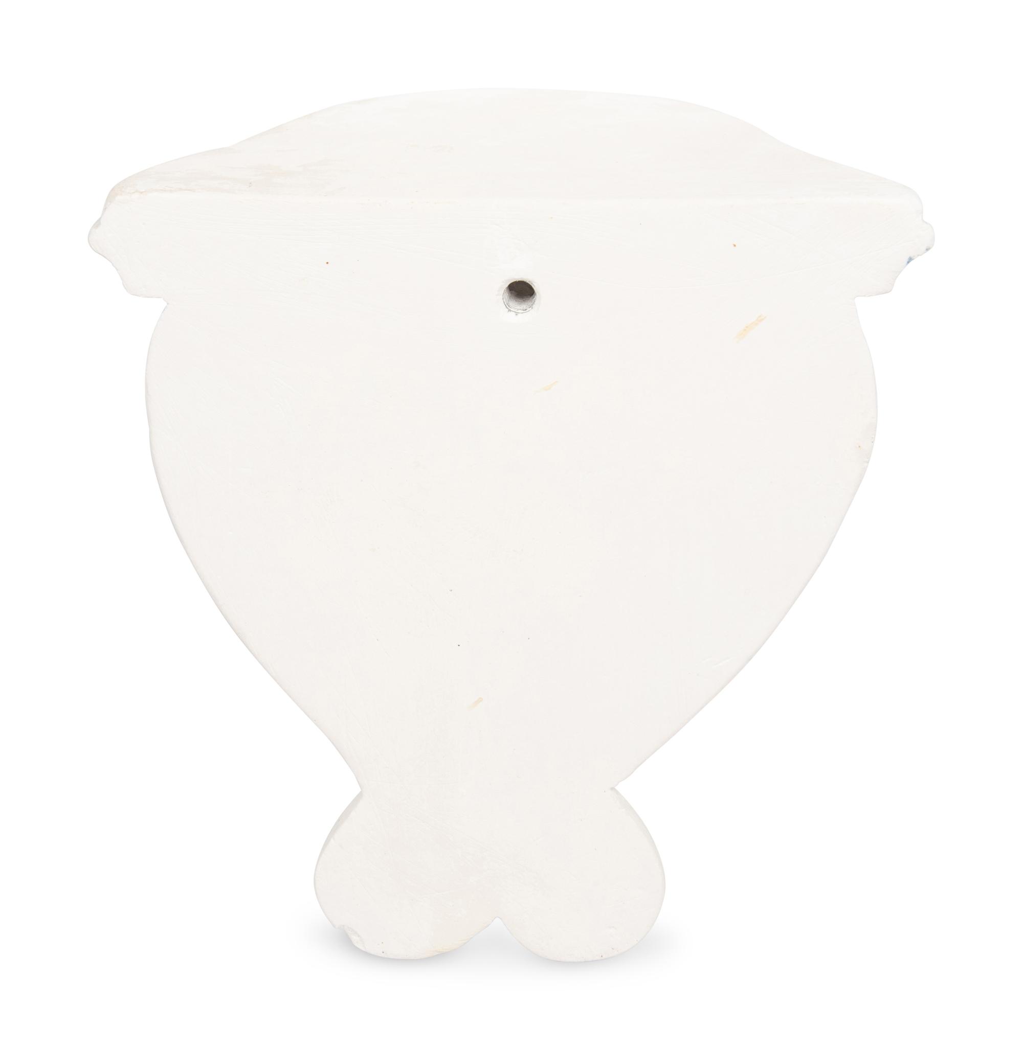 A Set of Nine Blue and White Plaster Wall Brackets