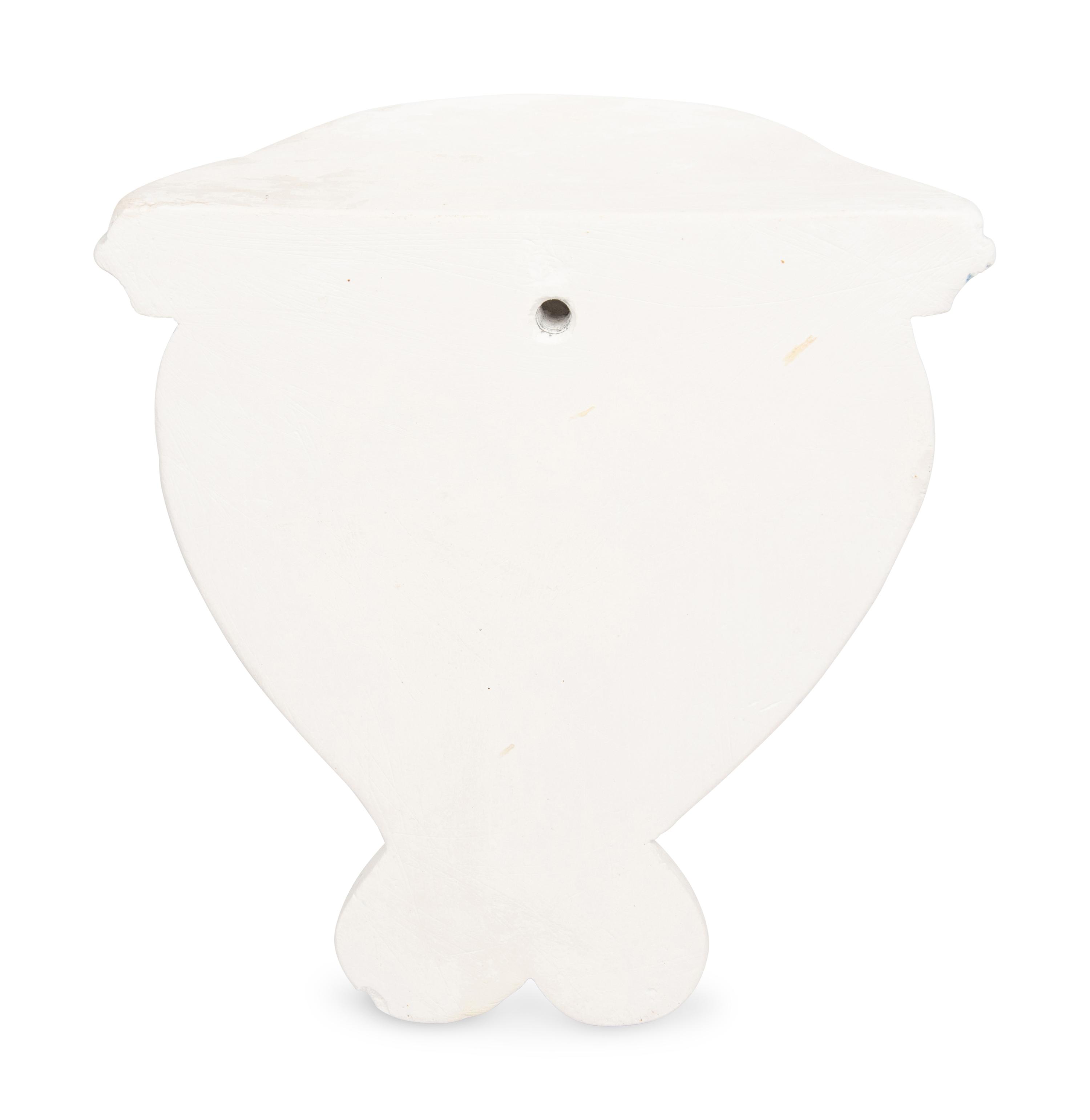 A Set of Nine Blue and White Plaster Wall Brackets