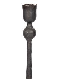 A Set of Eight Wrought Iron Candlesticks