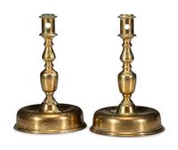 A Pair of Continental Brass Candlesticks