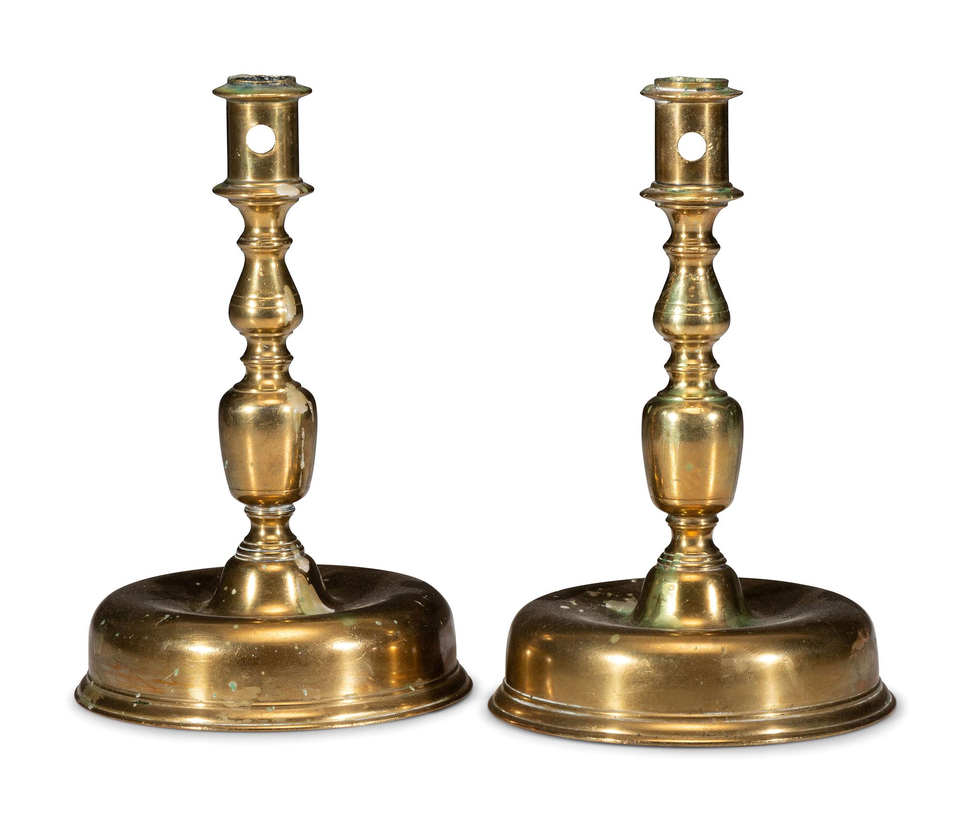 A Pair of Continental Brass Candlesticks