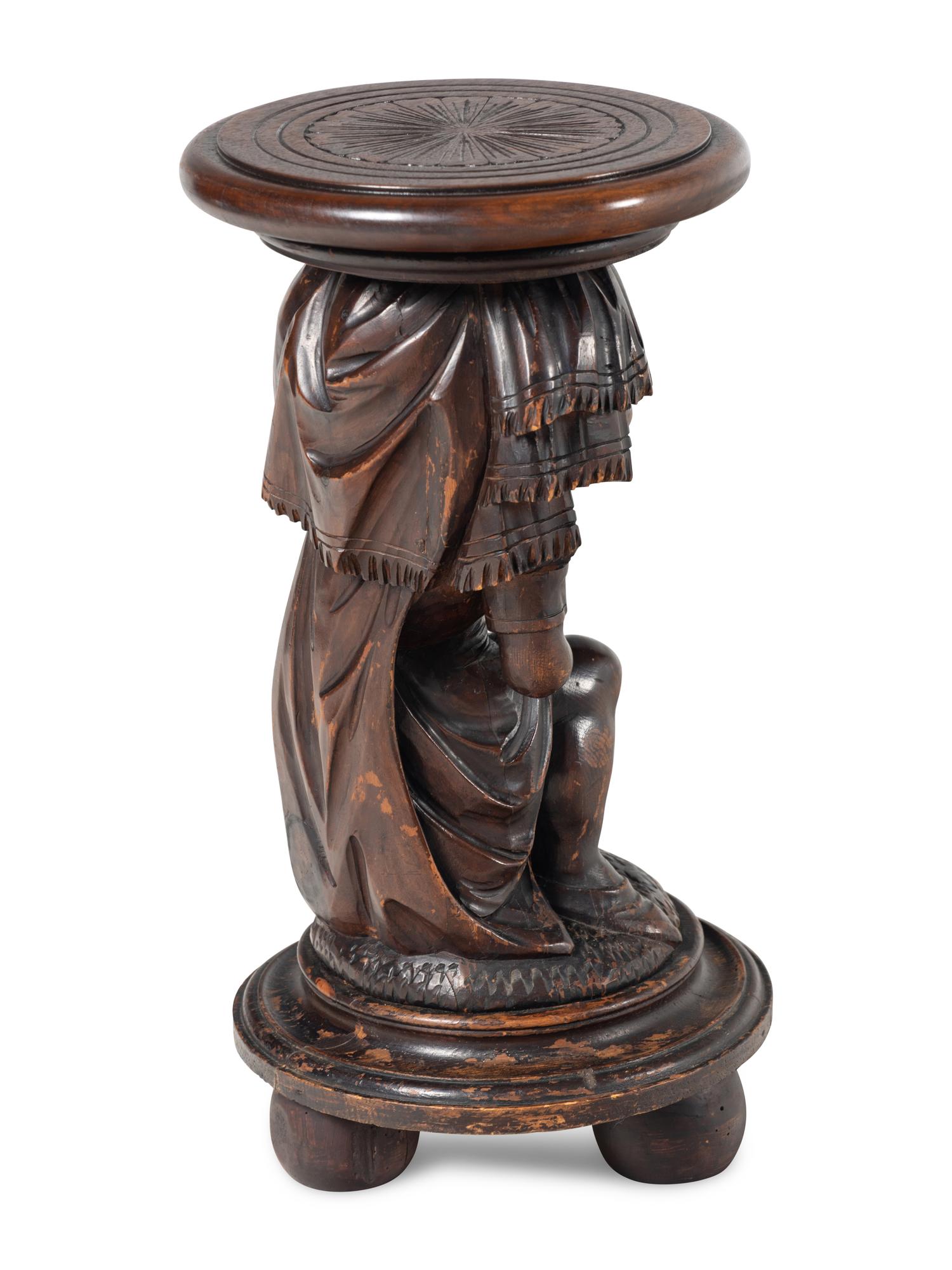 A Venetian Carved Walnut Figural Pedestal