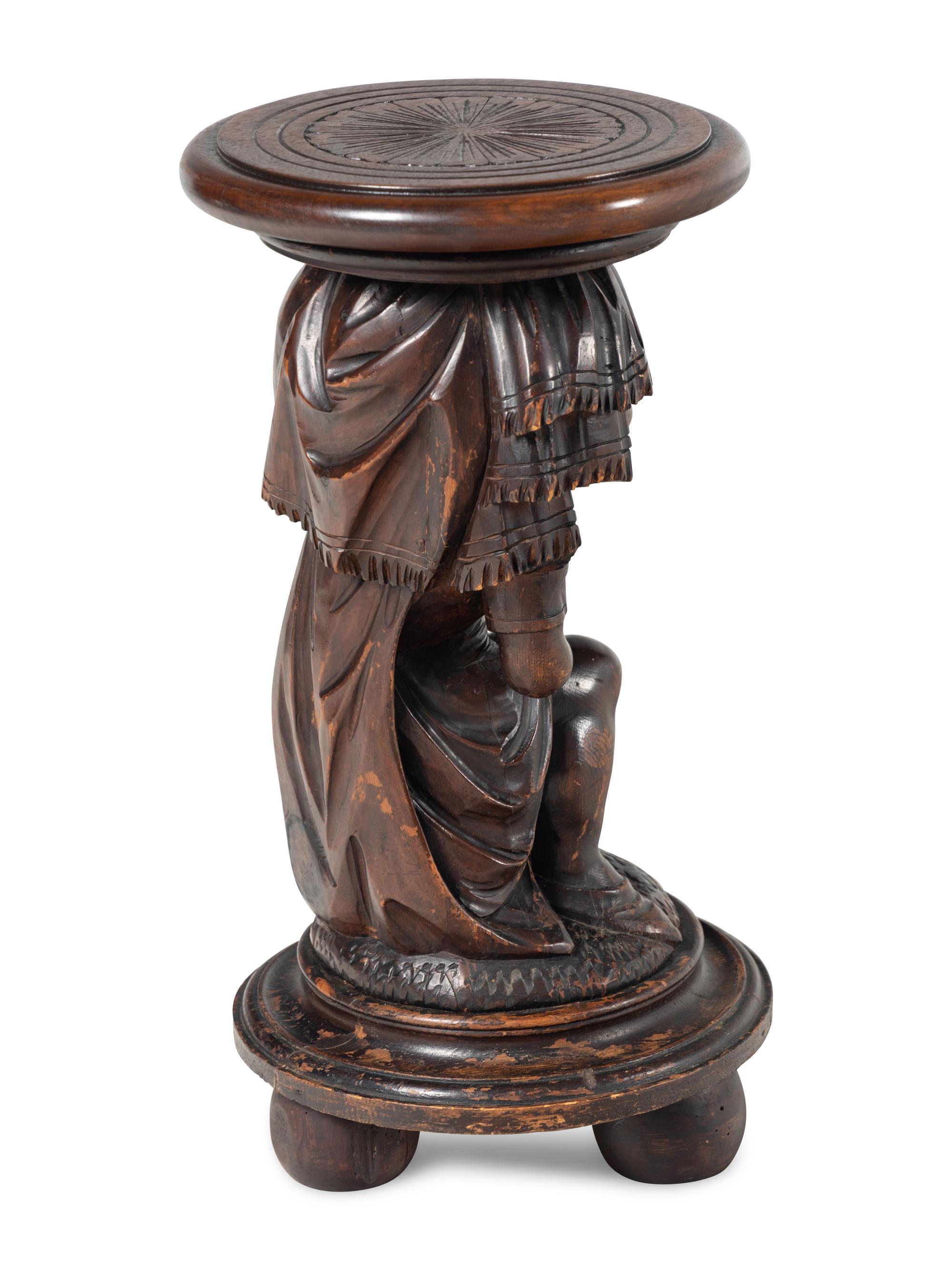 A Venetian Carved Walnut Figural Pedestal