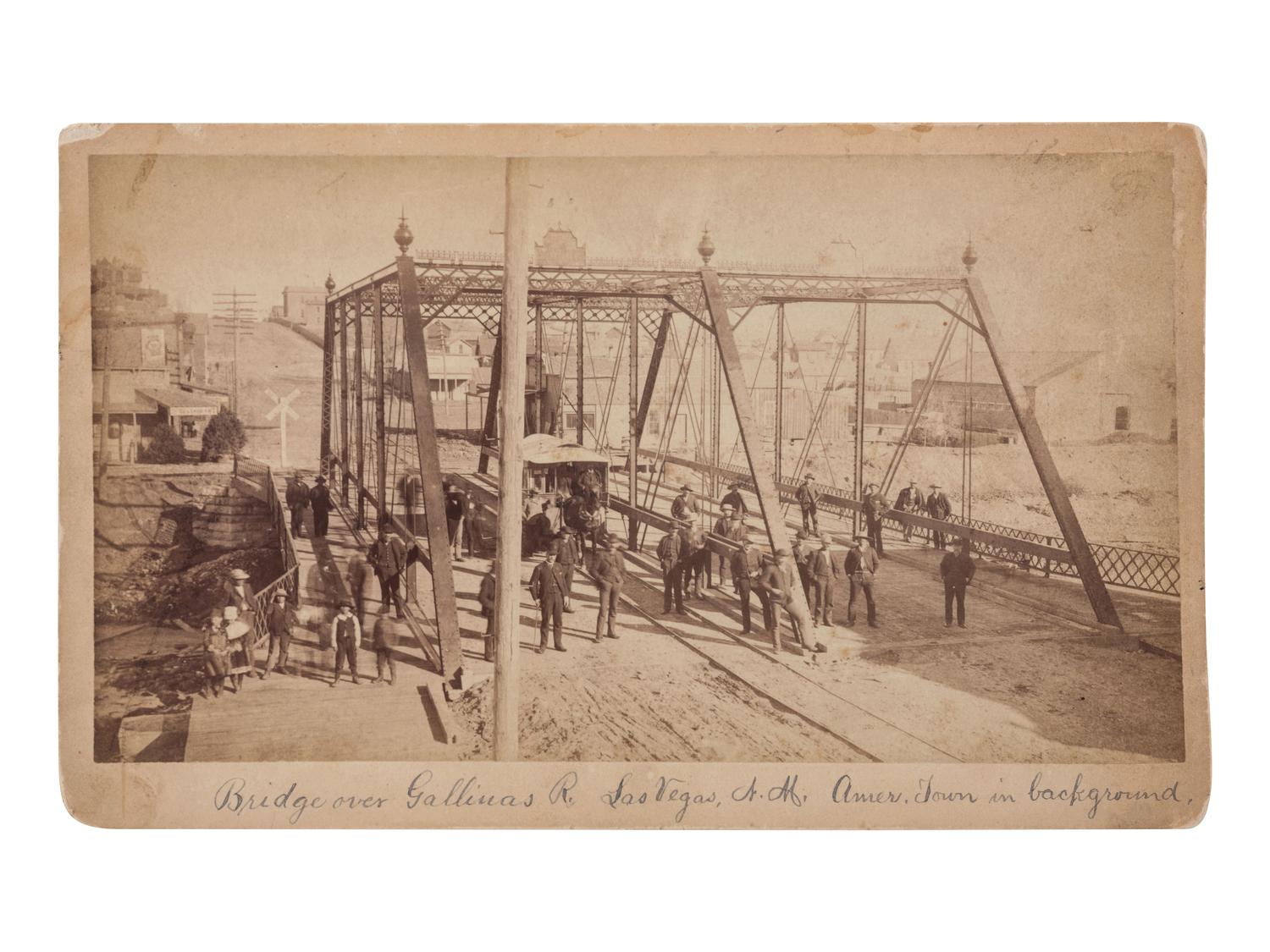 [NEW MEXICO]. Bridge over Gallinas R. Las Vegas, N. M. Amer. Town in background. N.p., n.p., ca. 1890.