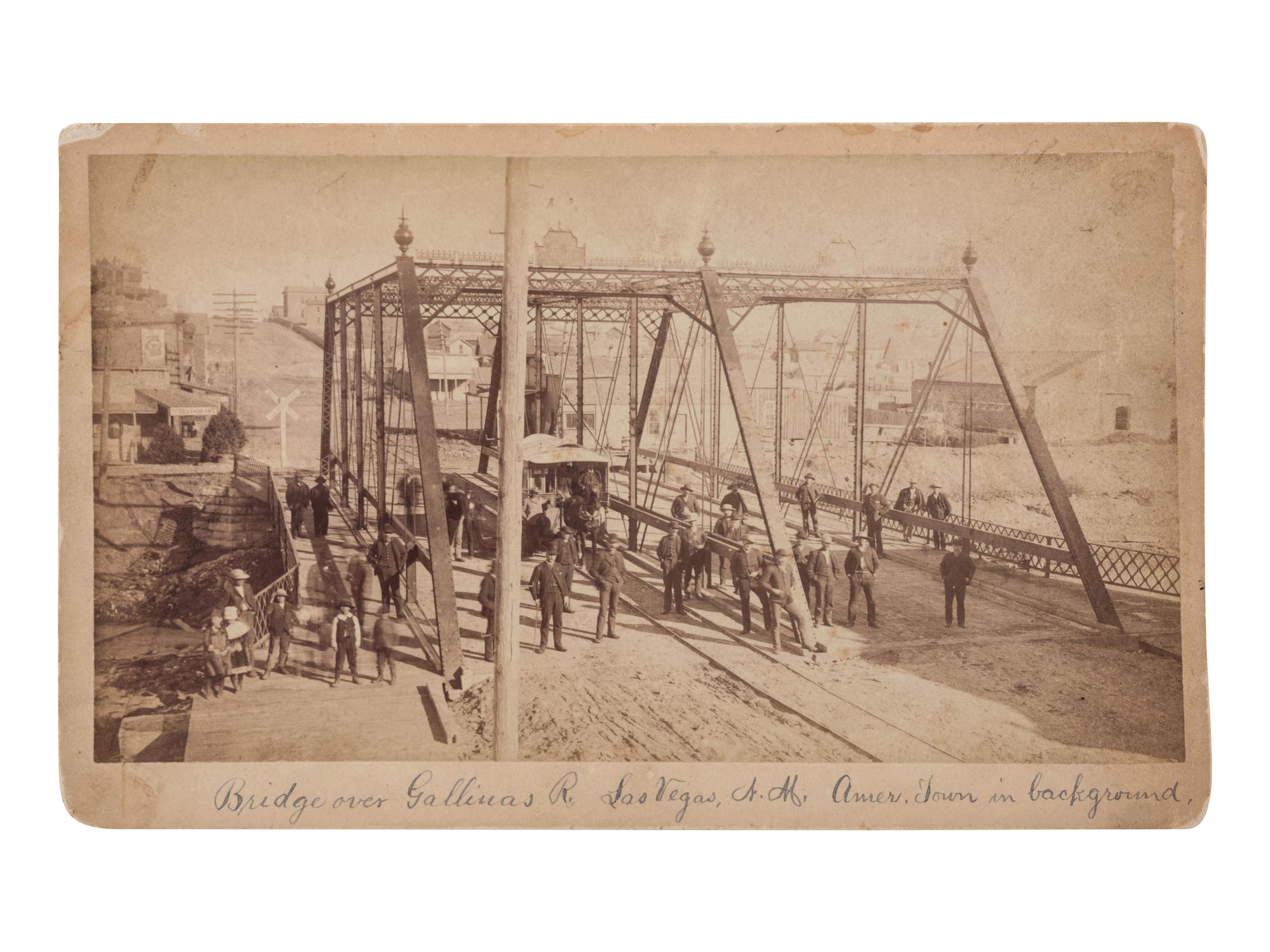 [NEW MEXICO]. Bridge over Gallinas R. Las Vegas, N. M. Amer. Town in background. N.p., n.p., ca. 1890.