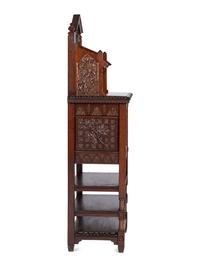 with carved floral and butterfly motifs
