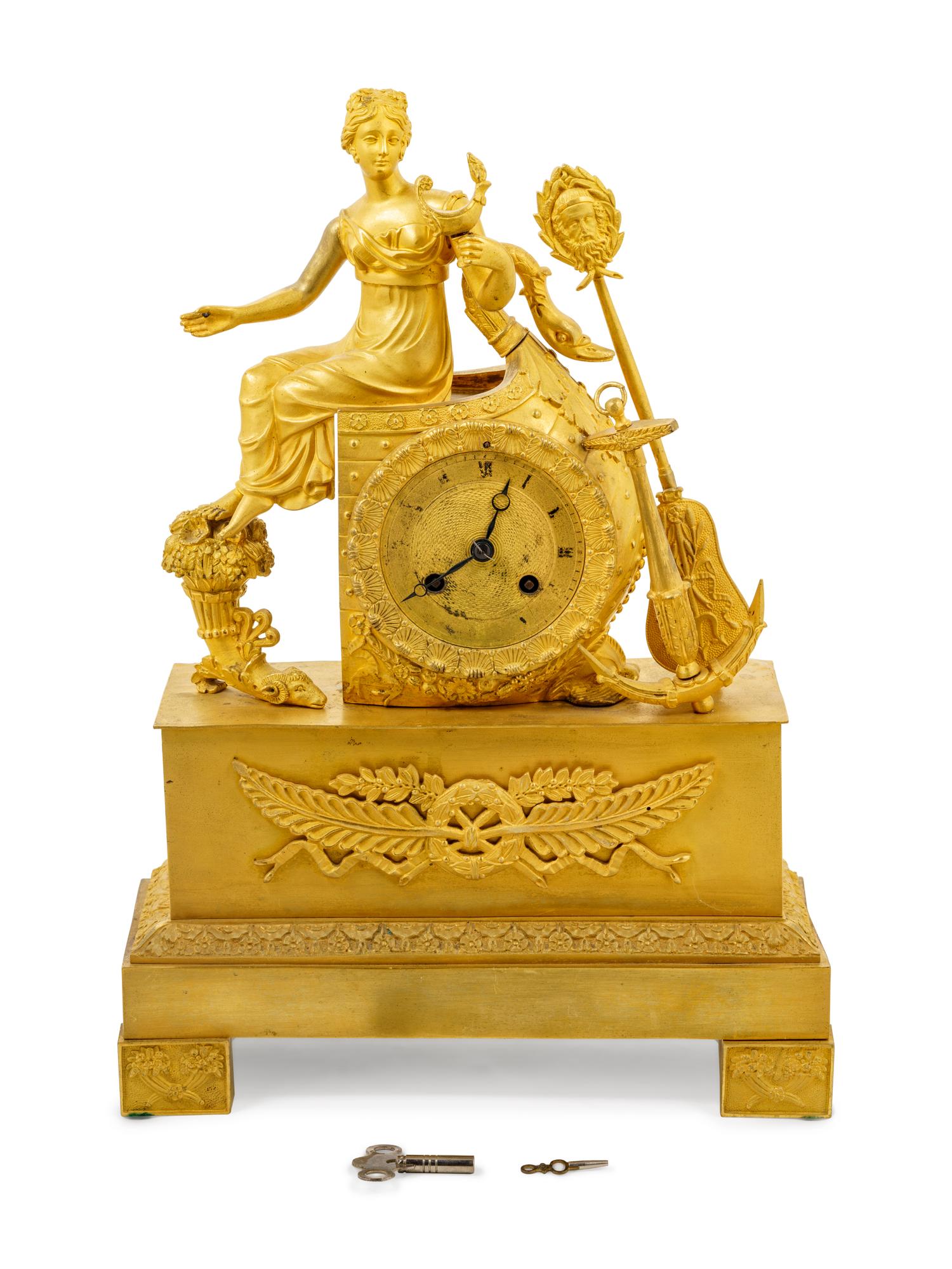 An Empire Gilt Bronze Figural Mantel Clock