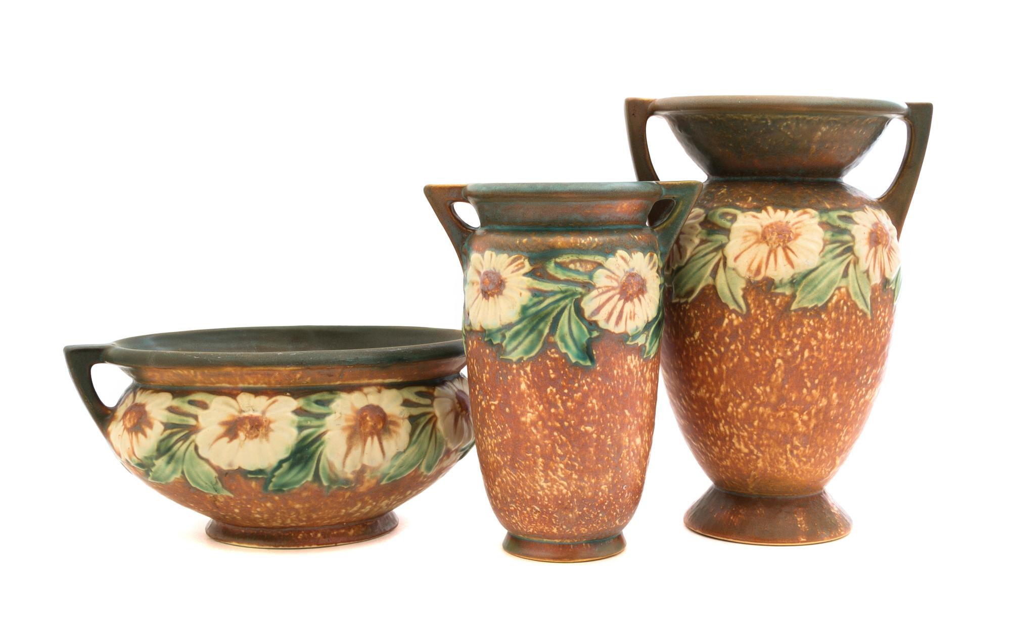 Three Roseville Dahlrose Pottery Vases Height of tallest 10 inches.