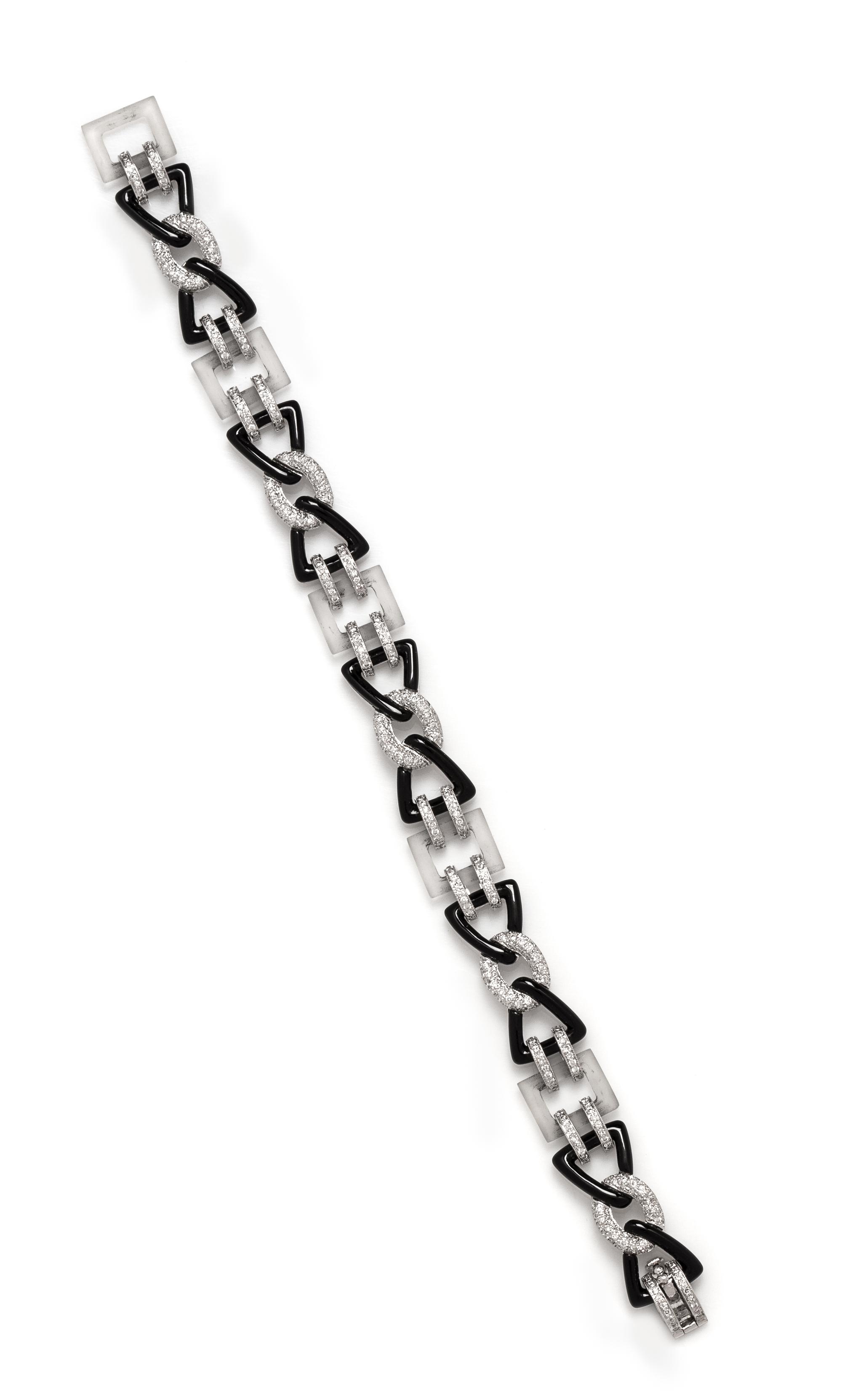 An 18 Karat White Gold, Diamond, Rock Crystal, and Onyx Bracelet,