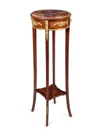 A Louis XVI Style Gilt Bronze Mounted Mahogany Marble-Top Pedestal Table