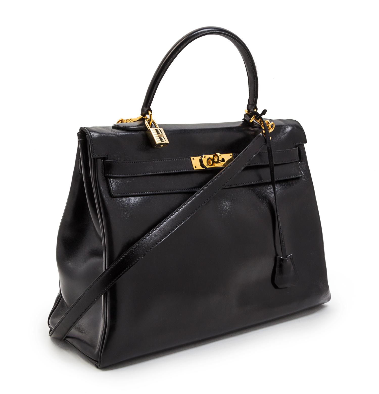 An Hermes 35cm Black Leather Kelly Bag, 14 x 8 x 7 inches.