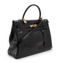 An Hermes 35cm Black Leather Kelly Bag, 14 x 8 x 7 inches.