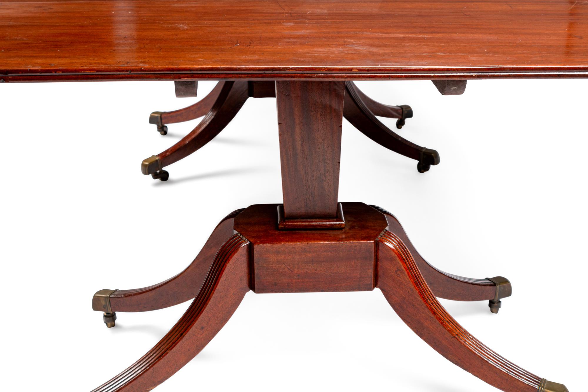 A Regency Mahogany Three-Pedestal Dining Table
