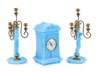 A Continental Blue Opaline Glass Three-Piece Clock Garniture