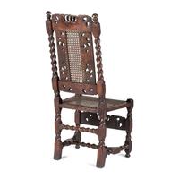 A William and Mary Crown-and-Flower Carved Oak and Cane Upholstered Side Chair