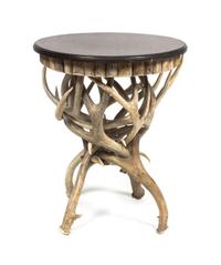 A Contemporary Antler Leg Circular Top Table Height 24 x diameter 19 1/2 inches.