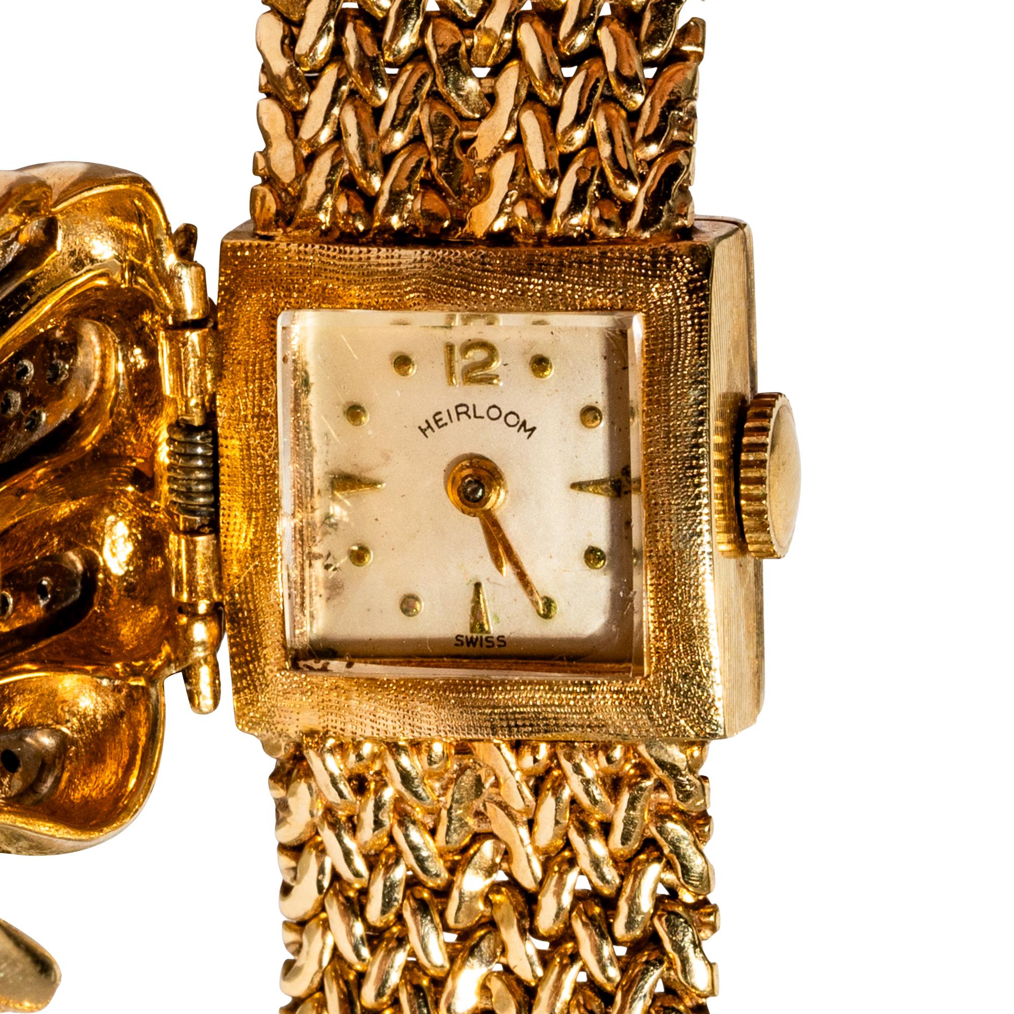 HEIRLOOM, RETRO, YELLOW GOLD AND DIAMOND SURPRISE WATCH