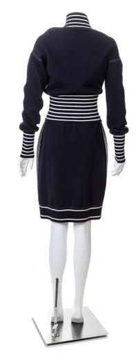 A Chanel Navy Three Piece Jacket and Skirt Ensemble, Jacket and skirt size 42, Top size 40.