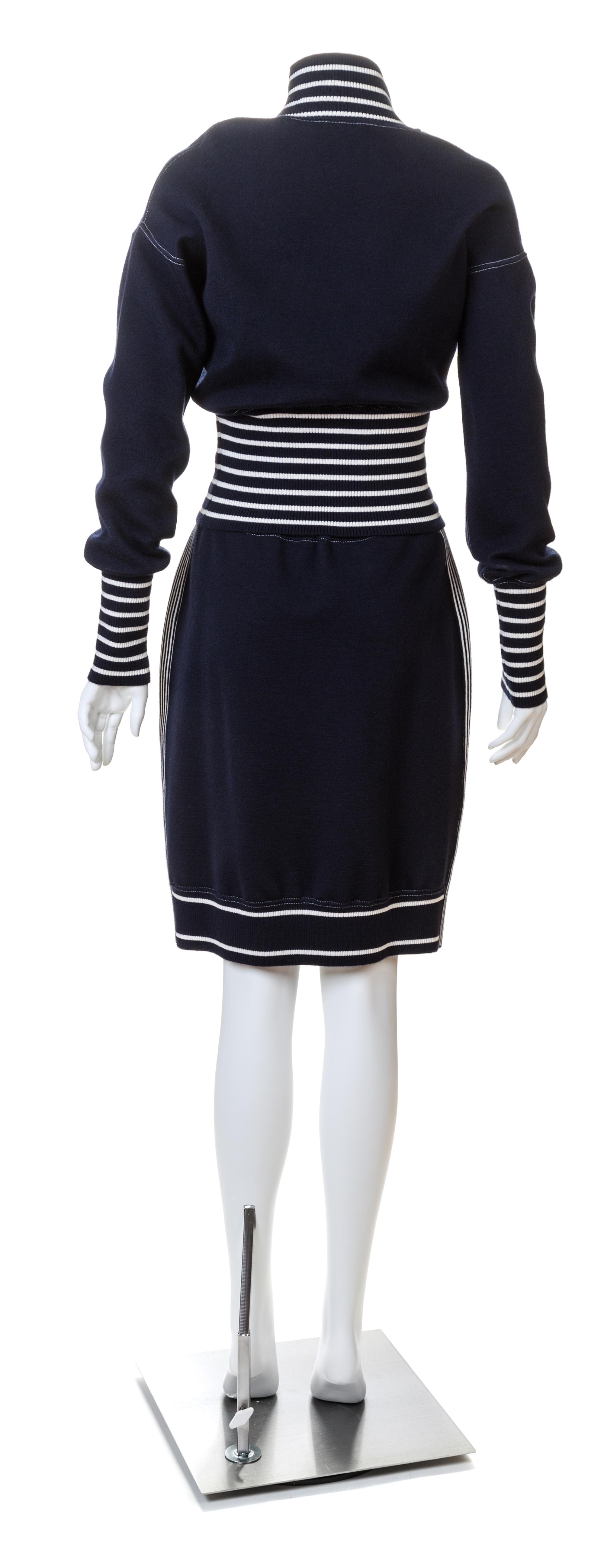 A Chanel Navy Three Piece Jacket and Skirt Ensemble, Jacket and skirt size 42, Top size 40.