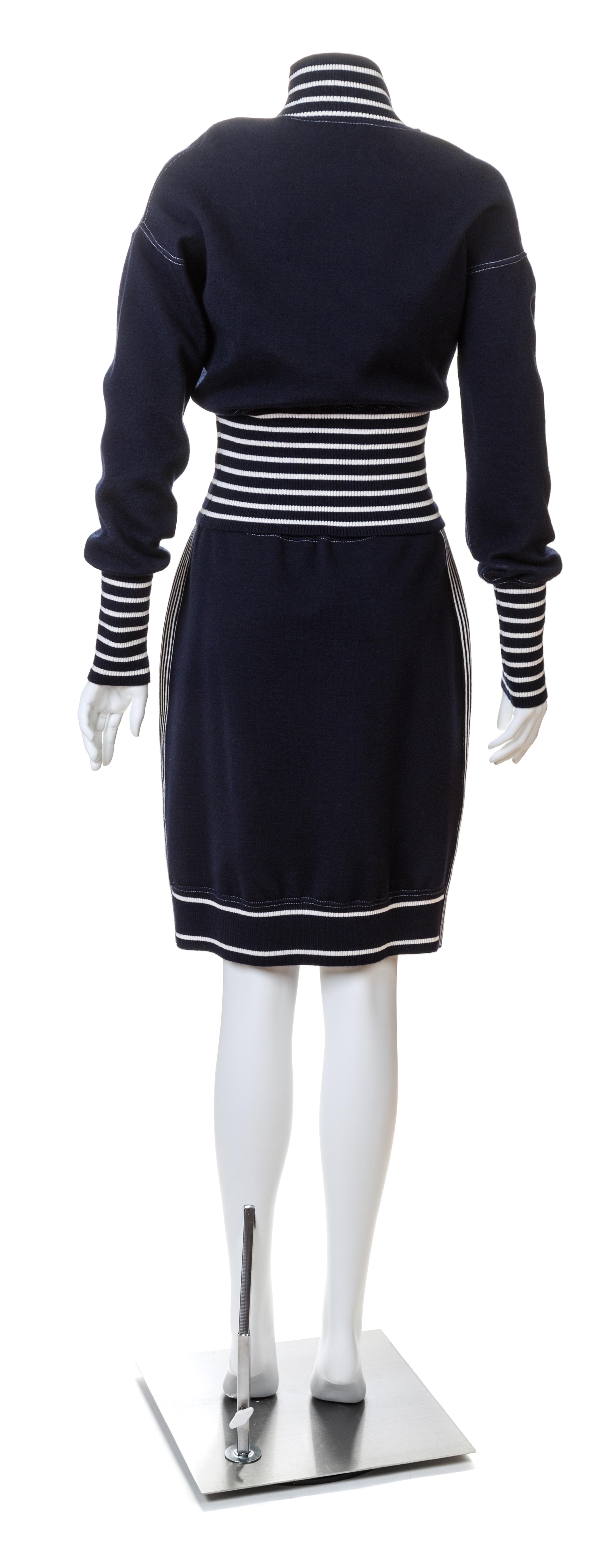 A Chanel Navy Three Piece Jacket and Skirt Ensemble, Jacket and skirt size 42, Top size 40.