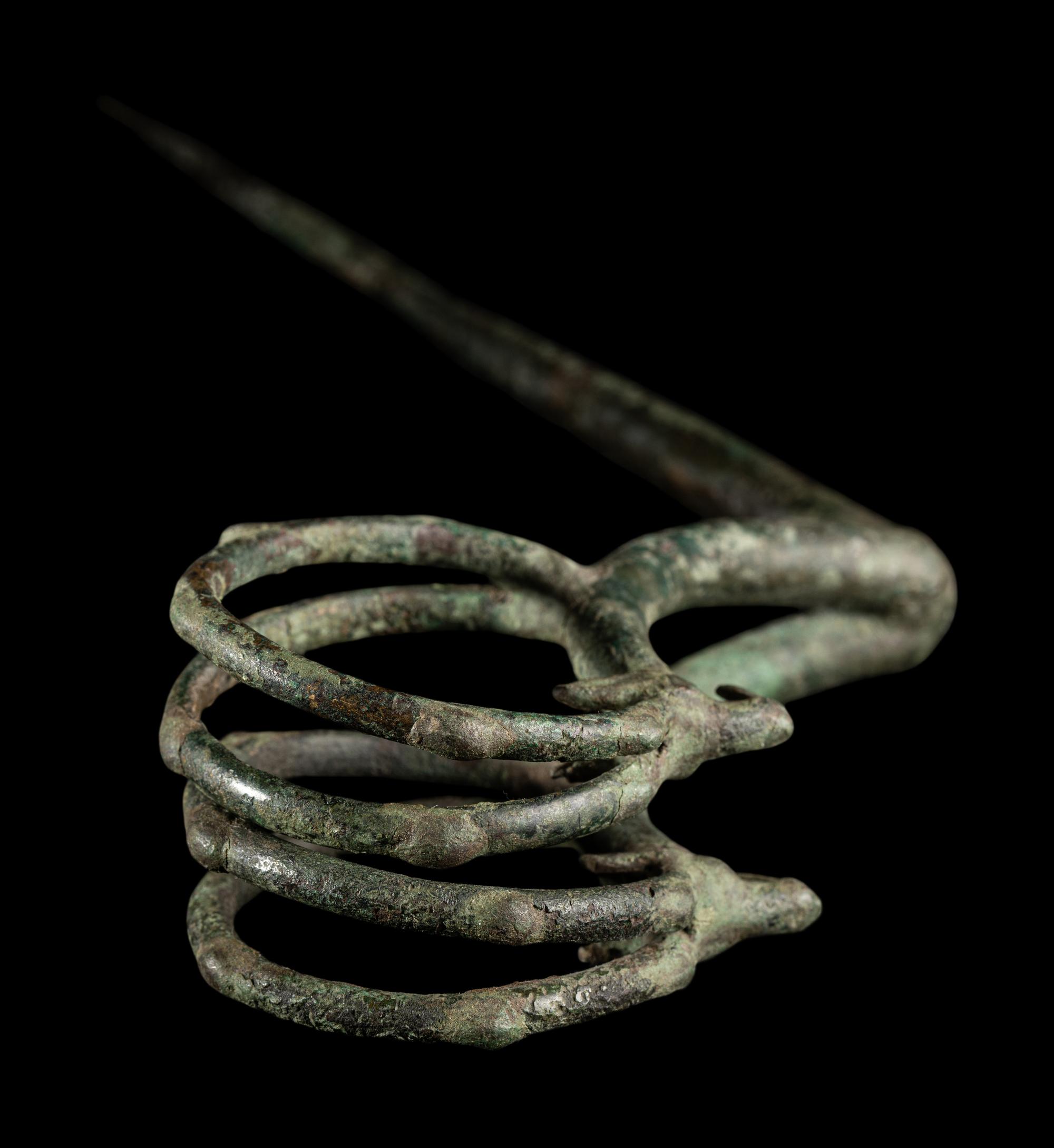 A Luristan Bronze Ibex Fibula