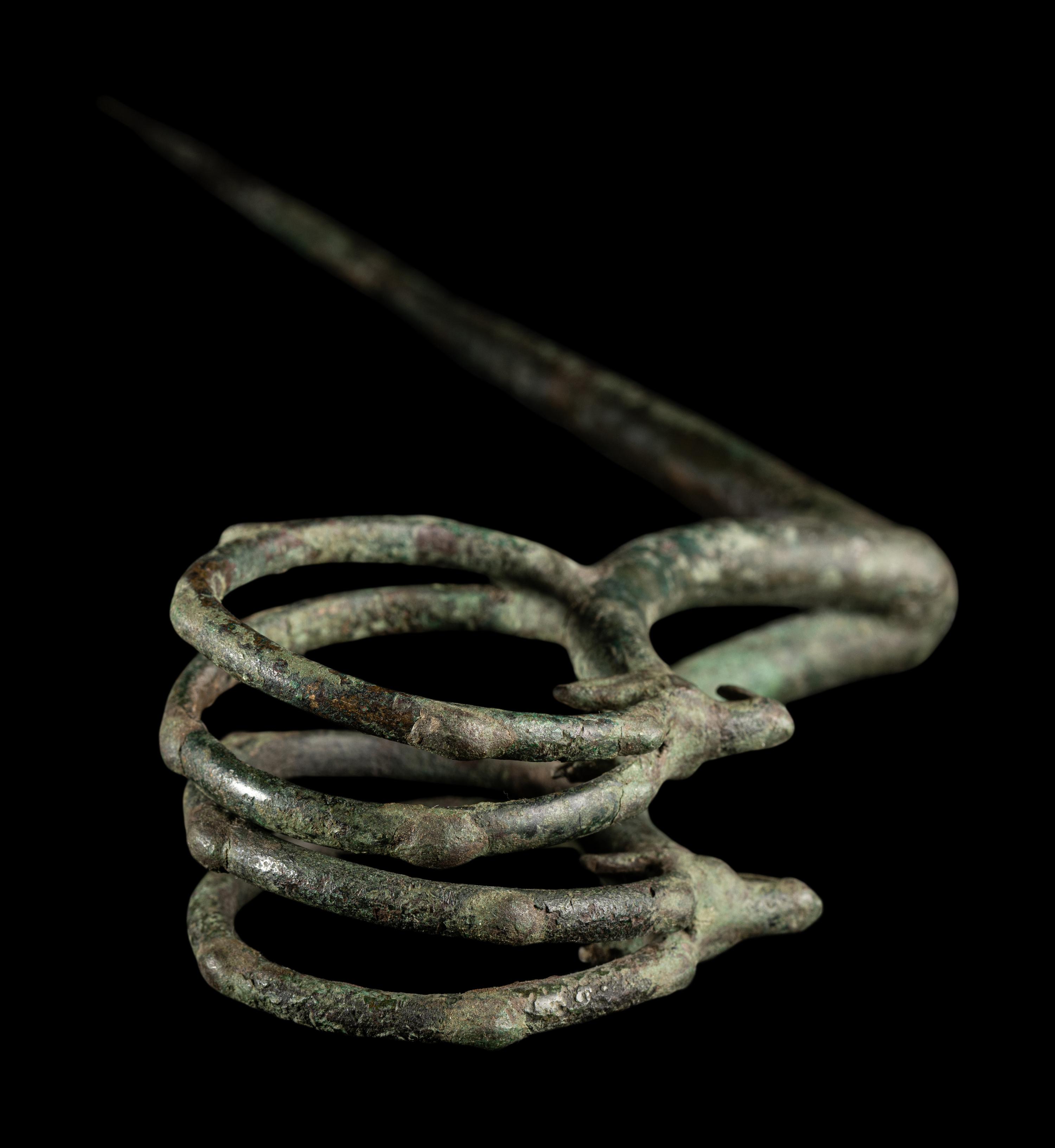 A Luristan Bronze Ibex Fibula
