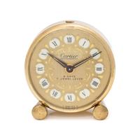 CARTIER, GILT-METAL TRAVEL ALARM CLOCK