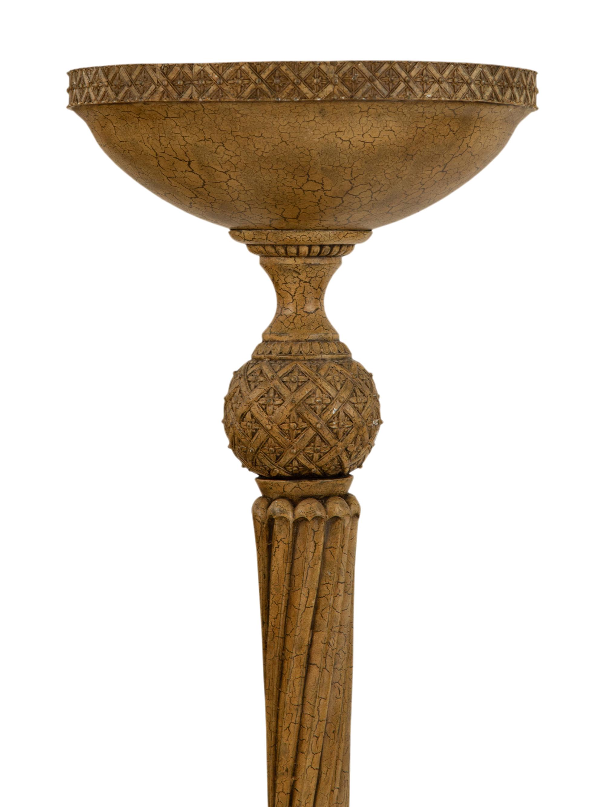 A Pair of Painted Metal and Carved Wood Torchere Style Floor Lamps
