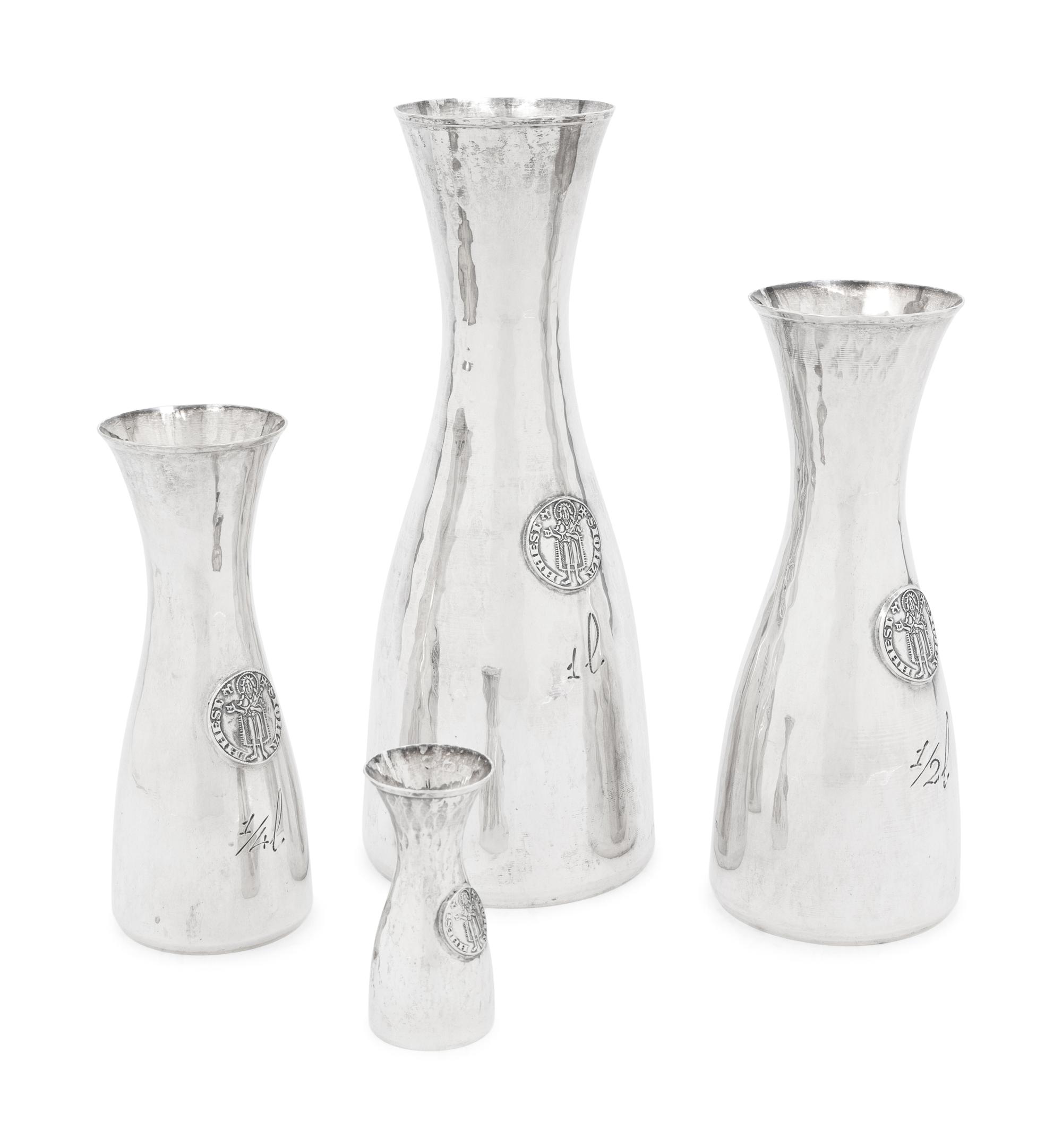Four Italian Silver Carafes