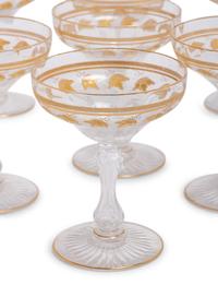 A Set of Eleven Parcel Gilt Champagne Coupes