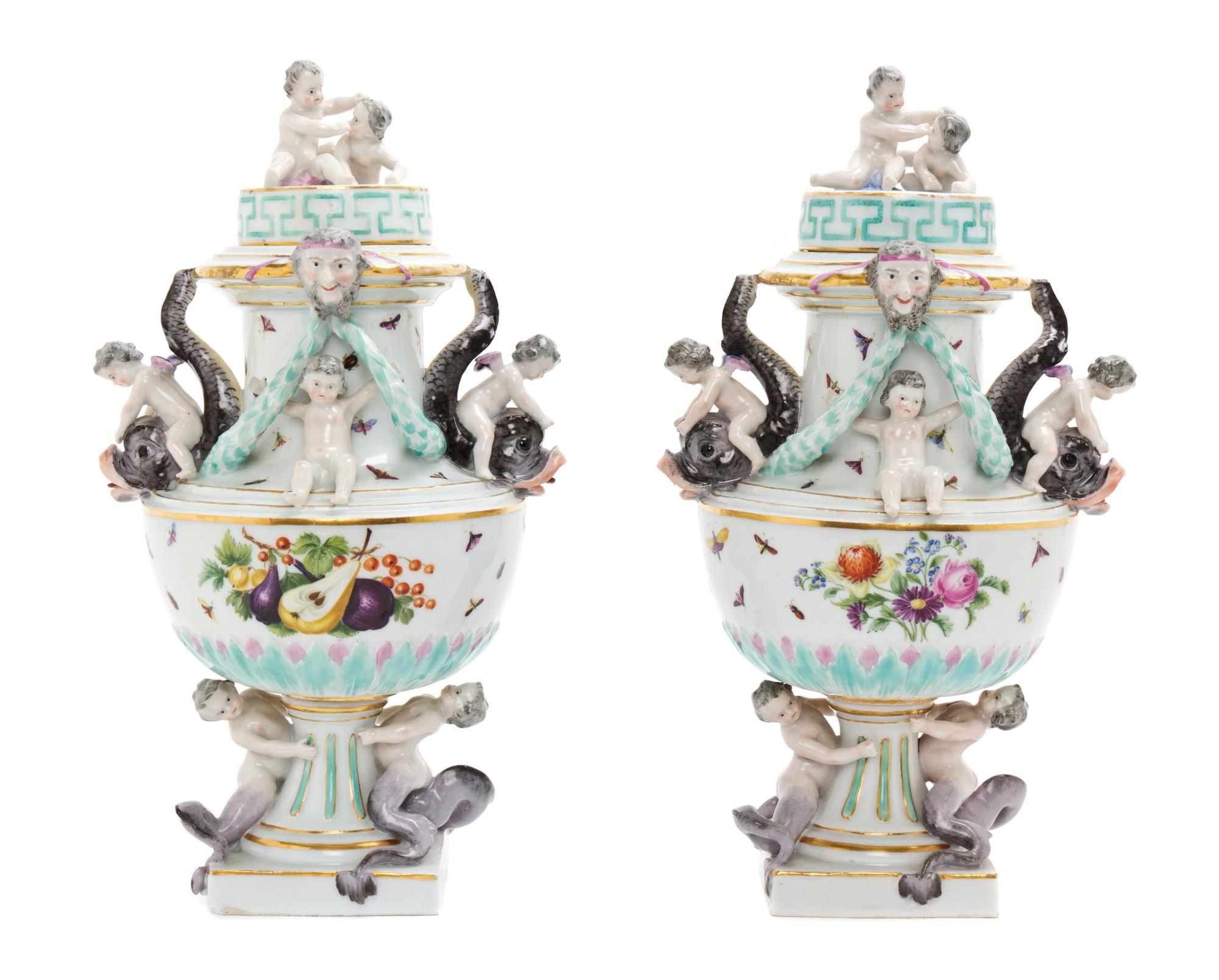 A Pair of Meissen Porcelain Covered Urns, Height 11 inches.