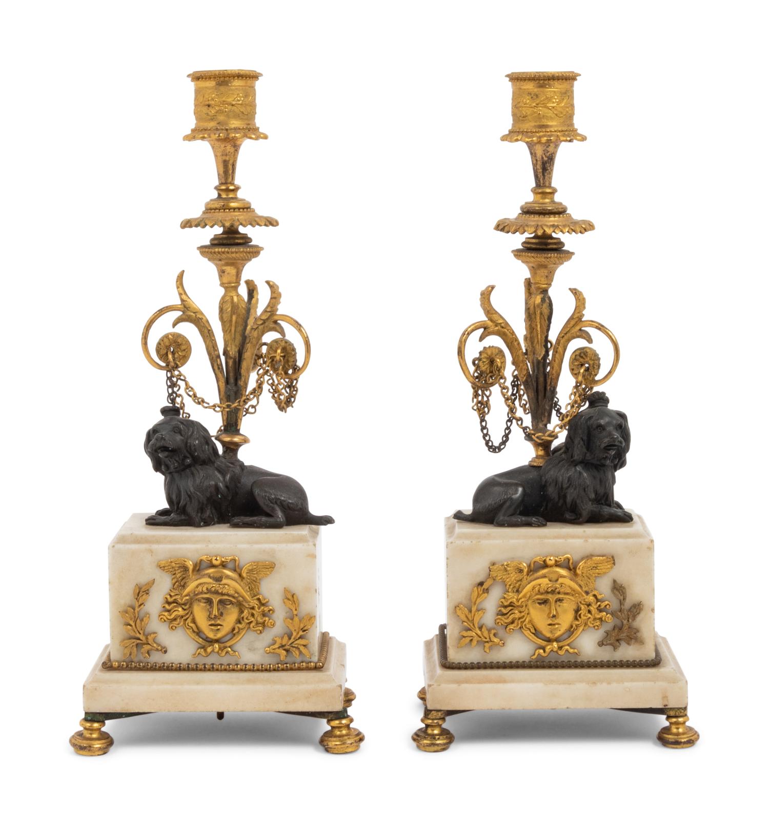 A Pair of Louis Philippe Gilt Bronze and Marble Candlesticks