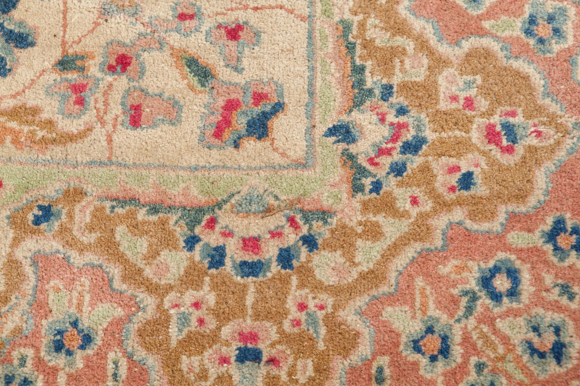 A Kirman Wool Rug