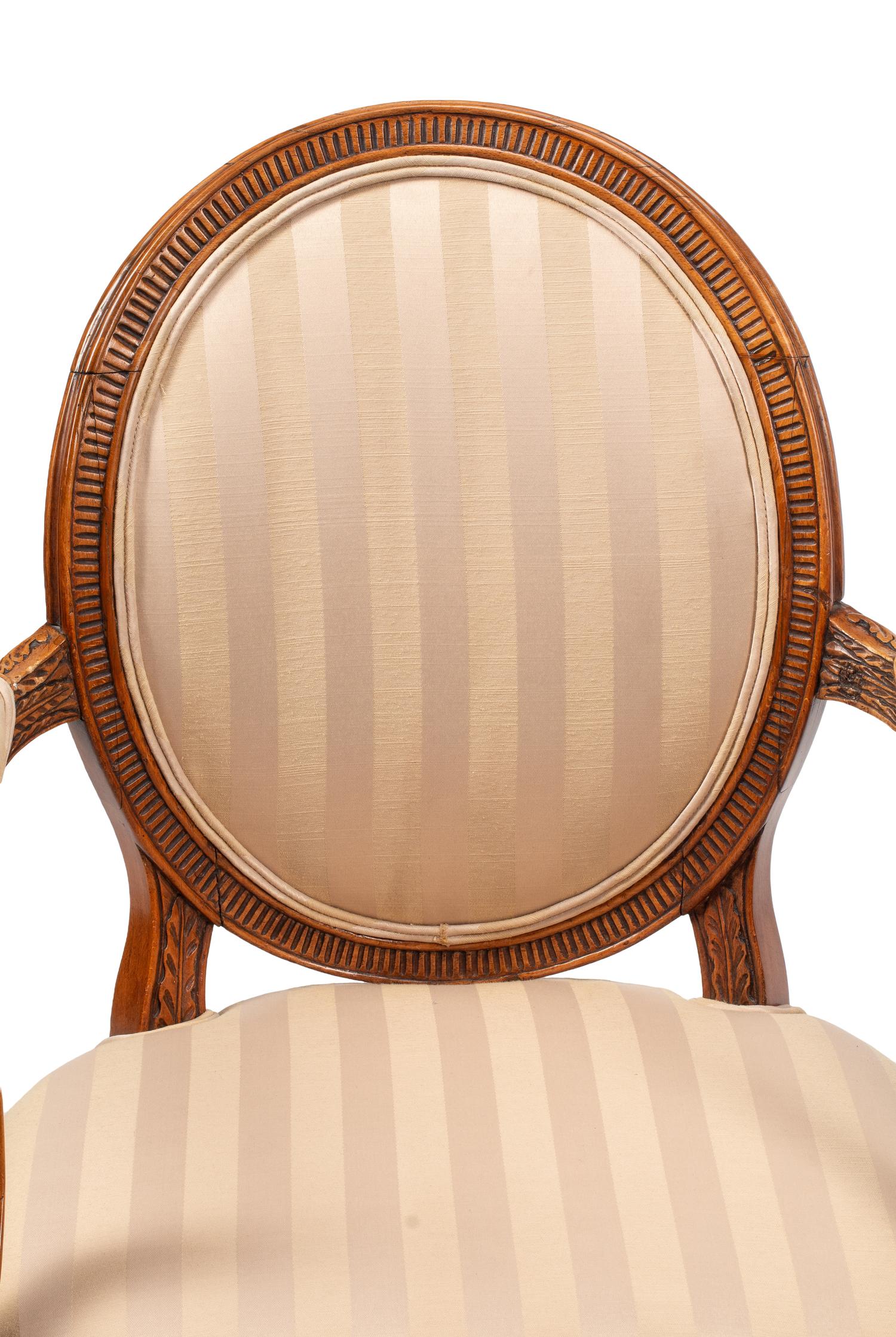 A Pair of George III Fruitwood Armchairs