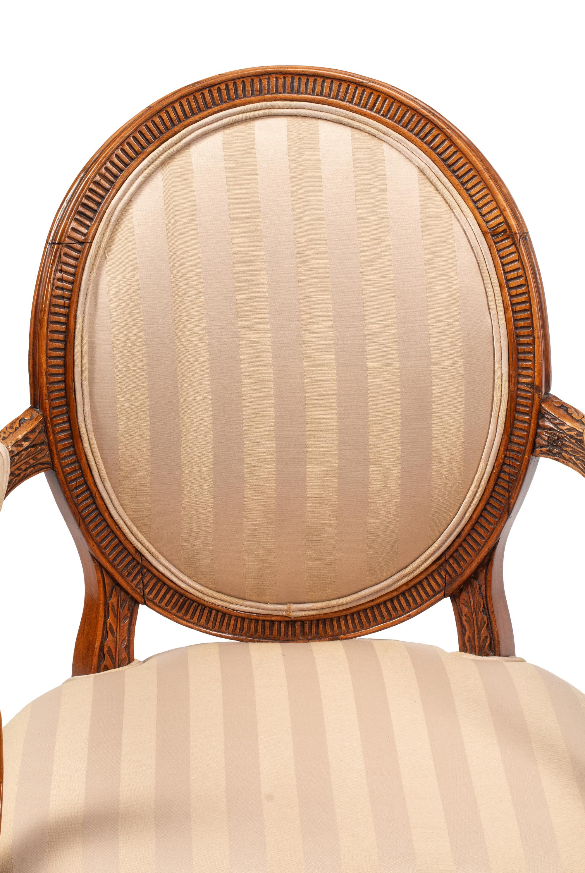 A Pair of George III Fruitwood Armchairs