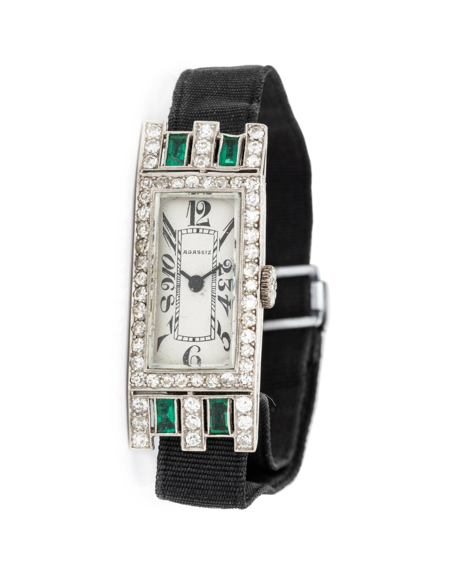 AGASSIZ, ART DECO, PLATINUM, DIAMOND AND EMERALD WATCH