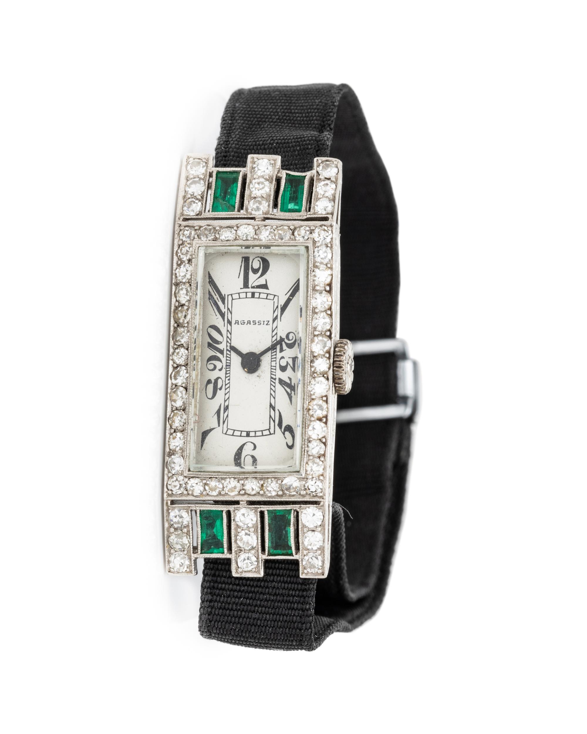 AGASSIZ, ART DECO, PLATINUM, DIAMOND AND EMERALD WATCH