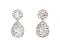A Pair of 18 Karat White Gold and Diamond Drop Earrings, 3.90 dwts.