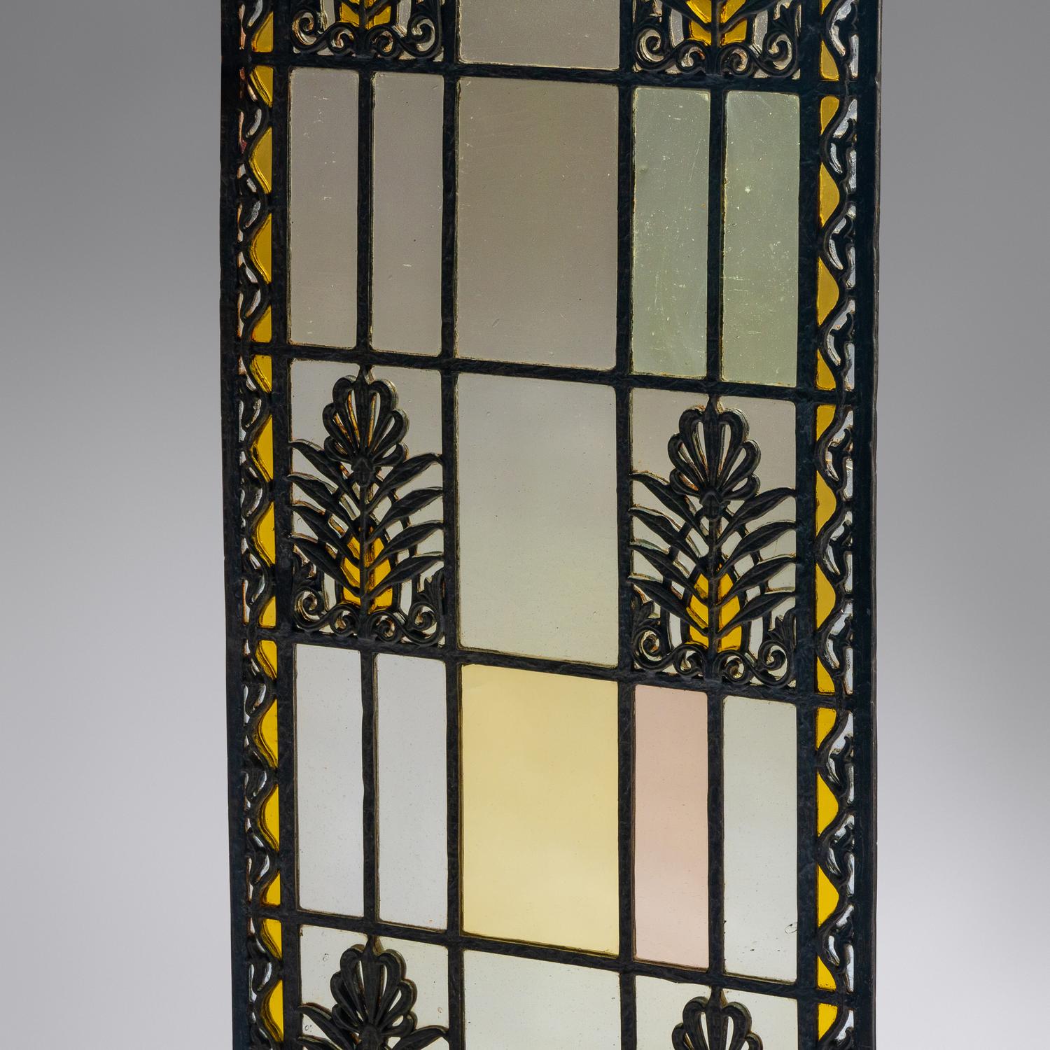 Window with double-sided grille