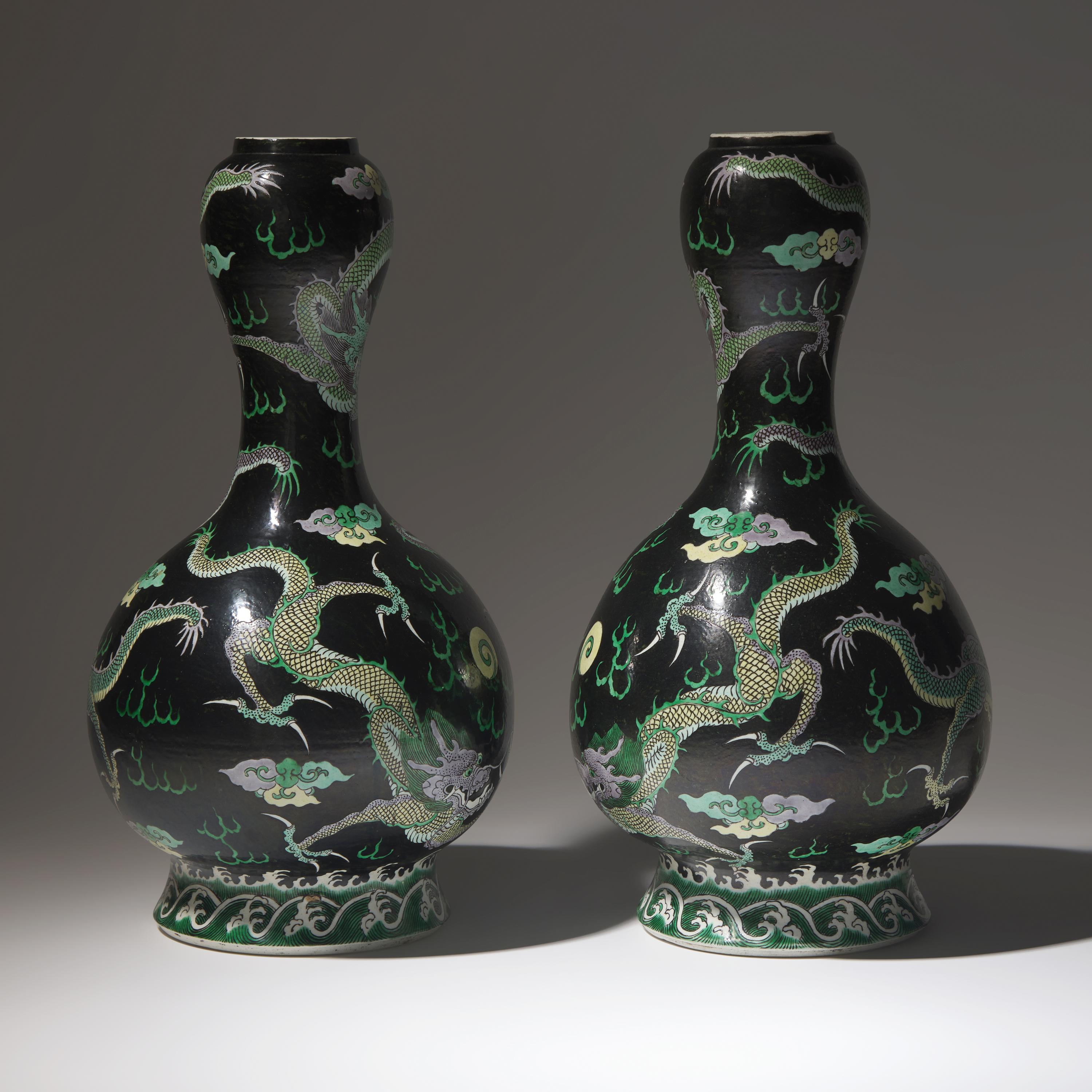 A Pair of Famille Noir 'Dragon' Garlic Head Vases, Late 19th/Early 20th Century — 清晚期 黑地五彩龍紋大蒜頭瓶一對