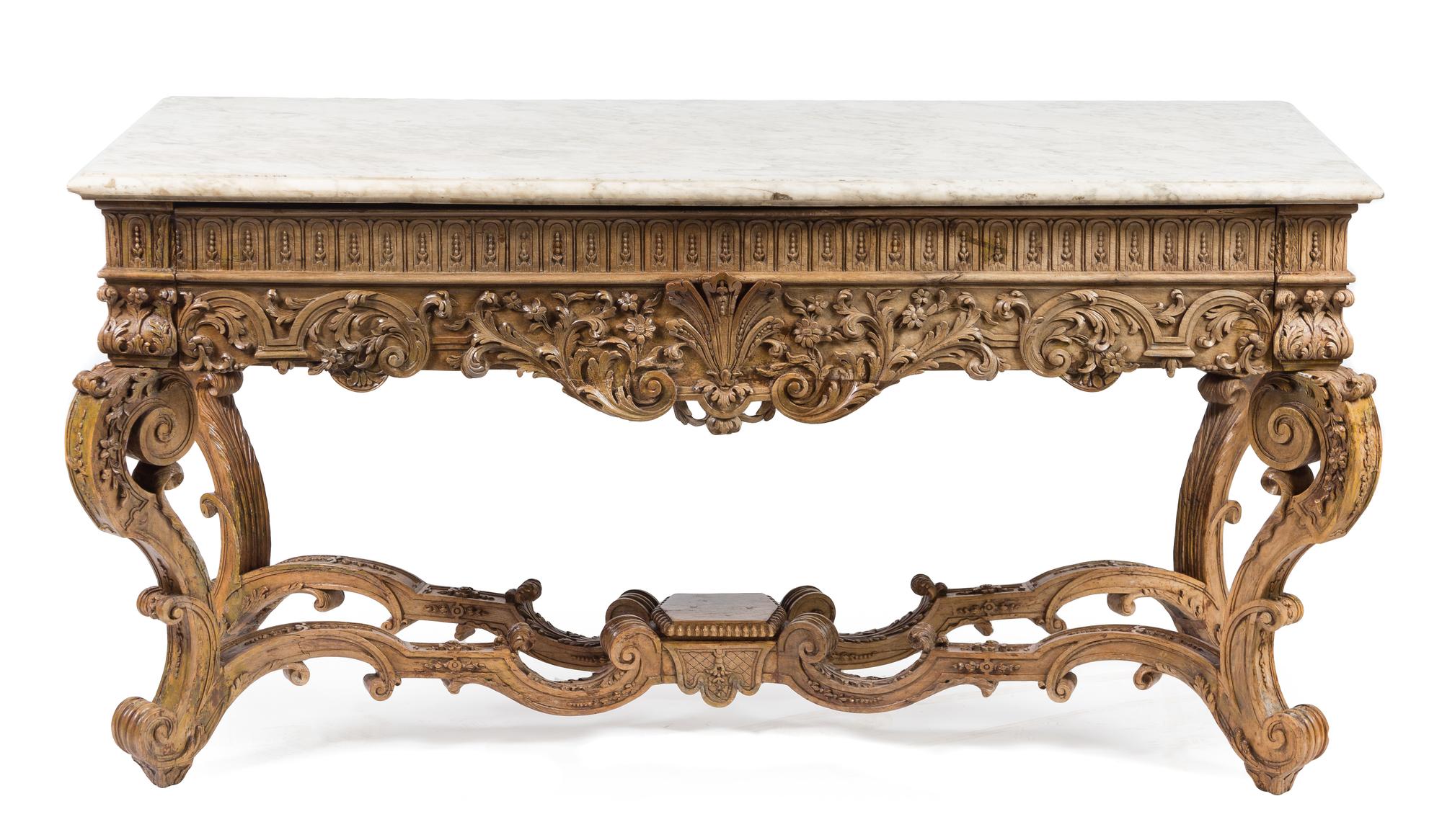 A Louis XIV Carved Console Table Height 32 1/2 x width 64 1/2 x depth 29 3/4 inches. — CIRCA 1720