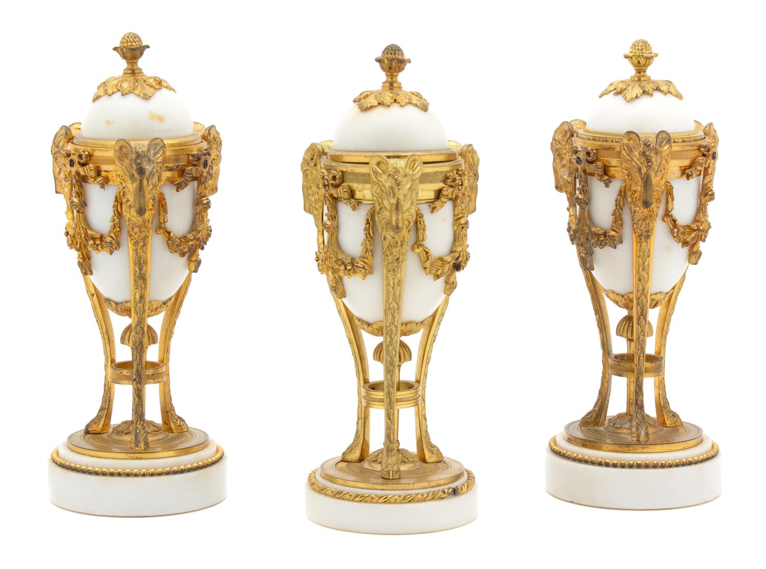 A Set of Three Louis XVI Style Gilt-Bronze-Mounted White Marble Cassoulettes Height 9 3/8 inches. — LATE 19TH/EARLY 20TH CENTURY