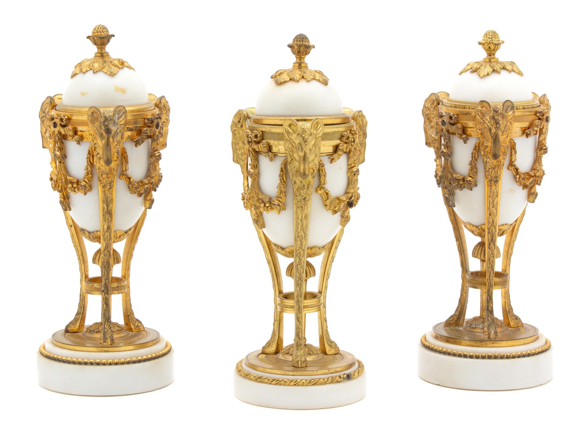 A Set of Three Louis XVI Style Gilt-Bronze-Mounted White Marble Cassoulettes Height 9 3/8 inches. — LATE 19TH/EARLY 20TH CENTURY
