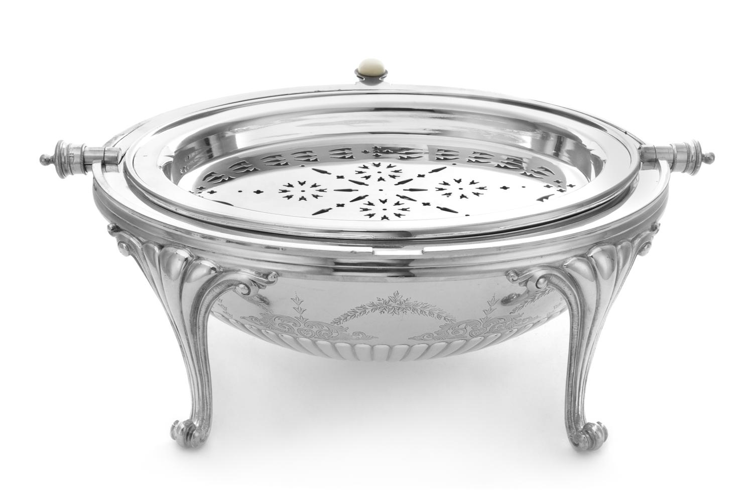 An English Silver-Plate Bacon Warmer, Elkington & Co., Birmingham, of ovoid form, the swiveling top with reeded decoration above foliat