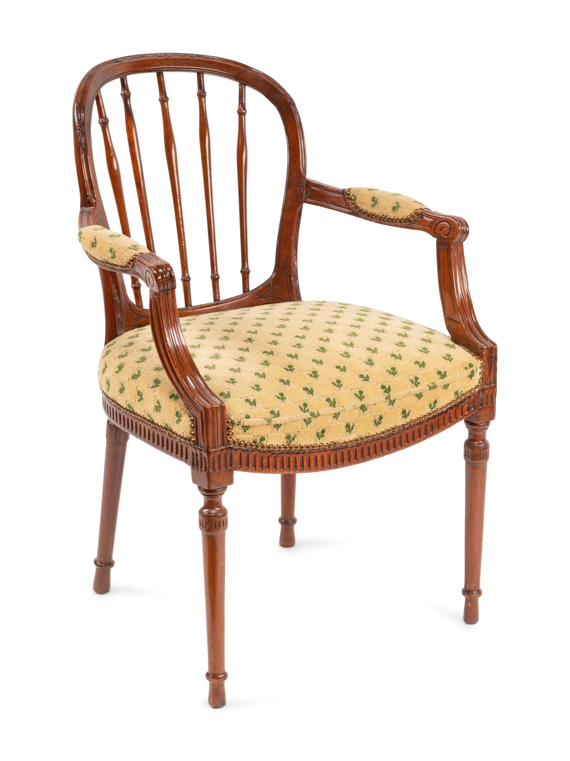 An Italian Neoclassical Walnut Armchair with Needlepoint Upholstery