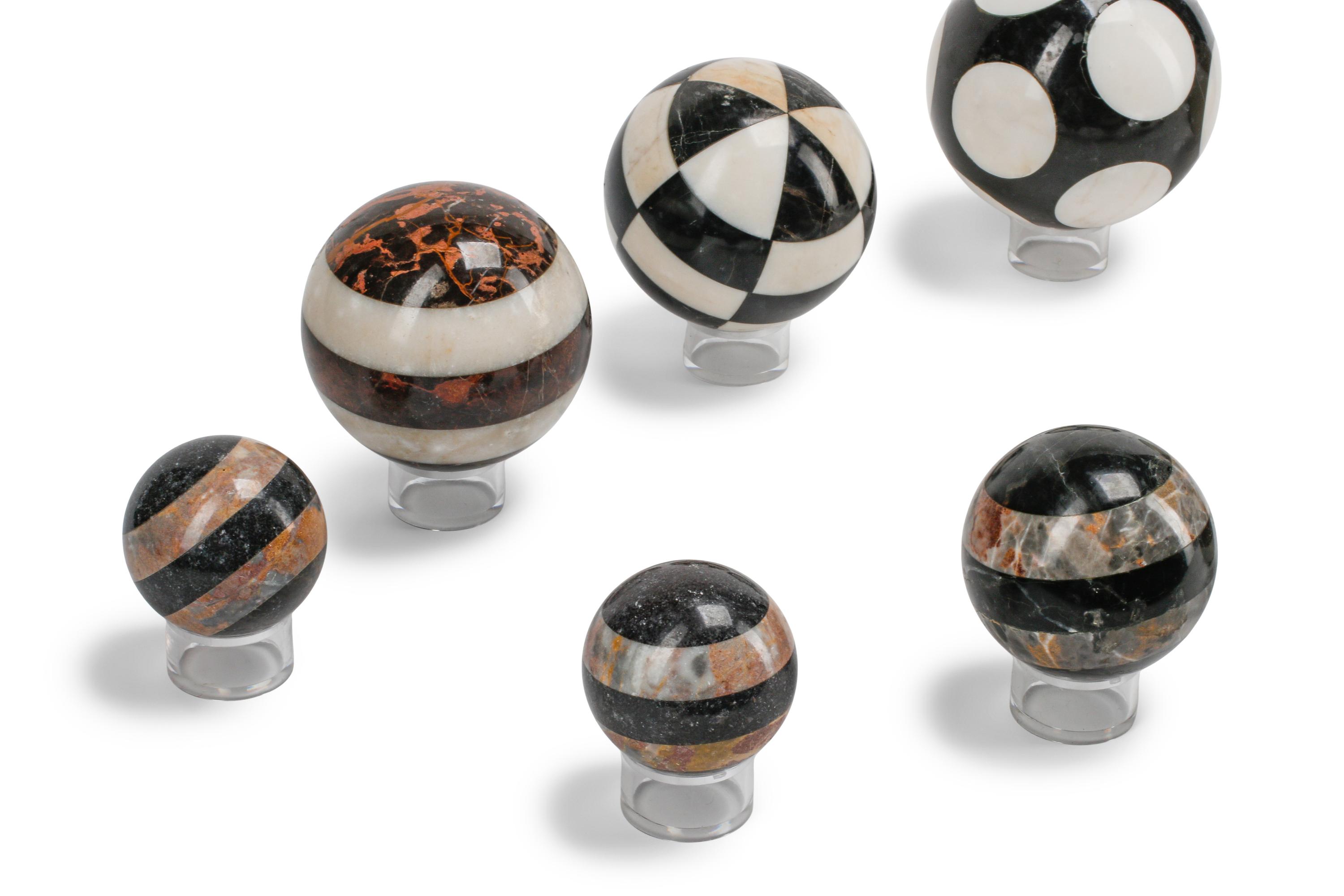A Set of Twelve Grand Tour Style Marble Spherical Ornaments